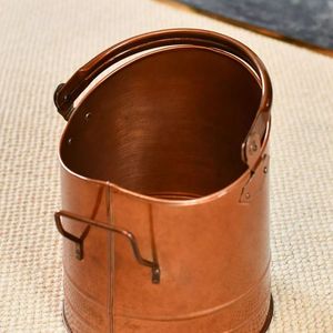 Classic shaped <b>copper</b> <b>coal</b> <b>scuttle</b> bucket with sturdy handle for everyday fireside <b>coal</b> or wood storage use - Product Image 4