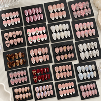 Kuku Palsu Pendek Almond Grosir Buatan Tangan 3D Bunga Berhias Rhinestone Kuku Artifisial Pemasok OEM ODM
