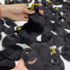 Extensiones de cabello Remy de alta calidad 100% al por mayor cabello humano vietnamita ondulado de cuerpo negro Natural extremos doblemente dibujados para tejer - Product Image 1