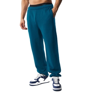 Pantalons de survêtement pour homme, coupe moderne, fabriqués avec un tissu extensible et durable, offrant un look élégant pour la salle de sport, la maison ou le streetwear - Product Image 1