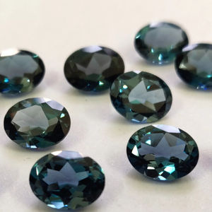 Topaze bleue de Londres naturelle taille ovale 6x8mm à facettes-Topaze bleue de Londres en vrac - Product Image 1