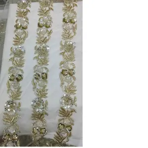 sequin and beaded ribbon ideal for use as borders on wedding dresses by clothing designers suitable for resale