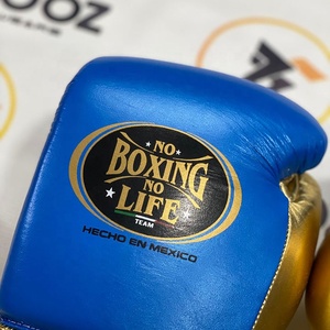 Professional Adjustable Lace-Up Genuine Leather Boxing <b>Gloves</b> Moisture Wicking Customized Golden Blue Colors for Gym Sparring - Product Image 2