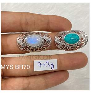 แหวนเครื่องประดับชั้นดี ดีไซน์ทันสมัย ประดับด้วยพลอยเทอร์ควอยซ์แท้และมูนสโตนสีรุ้ง รูปทรงวงรีสวยงาม แหวนทำมือ - Product Image 1