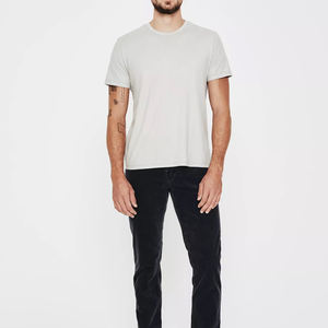 60% Poliéster 35% rayón 5% spandex. Soft Solif Color Camisetas Bella Canvas Unisex Tri-blend T Shirt - Product Image 1