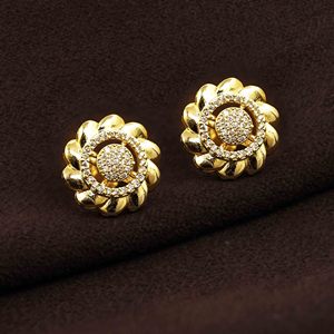 Aretes de Zirconia con Baño de Oro Micro de 14K, 18K y 24K, Forma de Flor, Venta al Por Mayor - Product Image 1