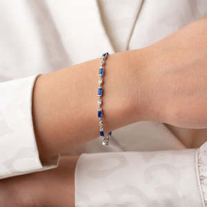 NOVAMART Fine Hallmark Fine <b>Charm</b> <b>Bracelet</b> with <b>Silver</b> and Dark Blue Baguette Stone Detailing Wholesale Export - Product Image 1