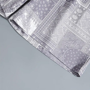 T-shirt à manches courtes avec lettres Pantalon de plage avec cordon de serrage Ensemble d'été deux pièces Imprimé Ensemble de t-shirts d'été tissés pour hommes - Product Image 4