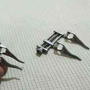 Abrazaderas microvasculares quirúrgicas de acero inoxidable Caronia para cirugía plástica y Neurocirugía Fuente de alimentación manual Certificación CE - Product Image 3