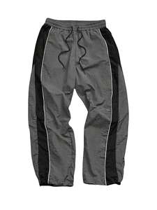 Pantalons de survêtement sportifs à jambes larges pour femmes personnalisés, pantalons parachute amples, pantalons de survêtement en nylon rayé, pantalons rayés teints en uni, décontractés - Product Image 2