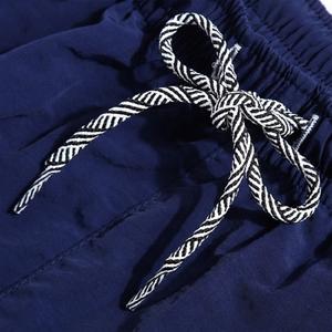 Shorts de sport en toile polyester/coton taille mi-haute de 7 pouces pour hommes, personnalisables, décontractés, unis, teints, pour la musculation et l'entraînement – Vente en gros - Product Image 4