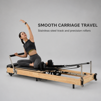 Machine de Pilates Reformer en bois de chêne avec barre de repose-pieds réglable et coussin en PU, portable pour la maison et le studio de fitness