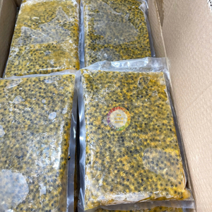 Pulpe congelée de fruit de la passion d'IQF dans l'emballage en vrac pour des usines et des distributeurs de jus - Product Image 1