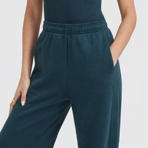 Pantalones acampanados holgados con bolsillos de pierna ancha negros con logotipo personalizado, pantalones cortavientos de nailon Cargo Unisex para mujer - Product Image 6