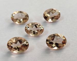 Morganita de color melocotón natural Corte ovalado 5x7mm Calidad superior facetada-Corte ovalado de morganita suelta - Product Image 1