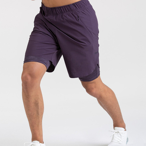 Pantalones cortos deportivos atléticos de verano al por mayor para hombres, pantalones cortos personalizados de malla de poliéster para correr, pantalones cortos para correr de gimnasio a la moda con patrón sólido - Product Image 1