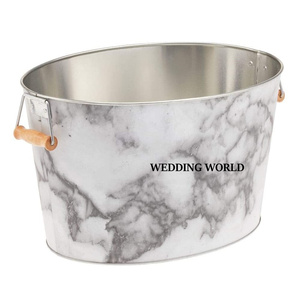 Jardinière en métal de forme ovale avec finition autocollante Meena, jardinière design de haute qualité, nouvelle jardinière en métal de luxe - Product Image 1