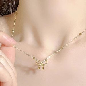 Collana con girocollo con fiocco in oro 18K TESTRYE per donne alla moda con fiocco e papillon - Product Image 3