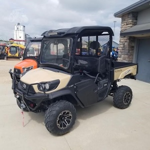 Vehículo utilitario CFMOTO UTV de 650cc, 4 tiempos, 4x4, a gasolina, color arena y negro, con cabina completa y puertas. - Product Image 6
