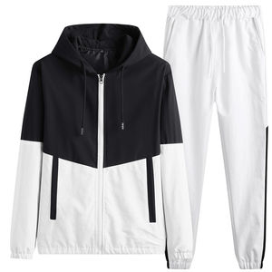 Ensemble de jogging en polyester personnalisé pour hommes Veste de survêtement et pantalon zippés en deux pièces avec imprimé patchwork respirant Survêtement personnalisé - Product Image 2