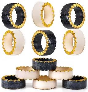 Handmade resin napkin rings with traditional <b>floral</b> engravings for unique and stylish <b>dinner</b> <b>settings</b> - Product Image 5