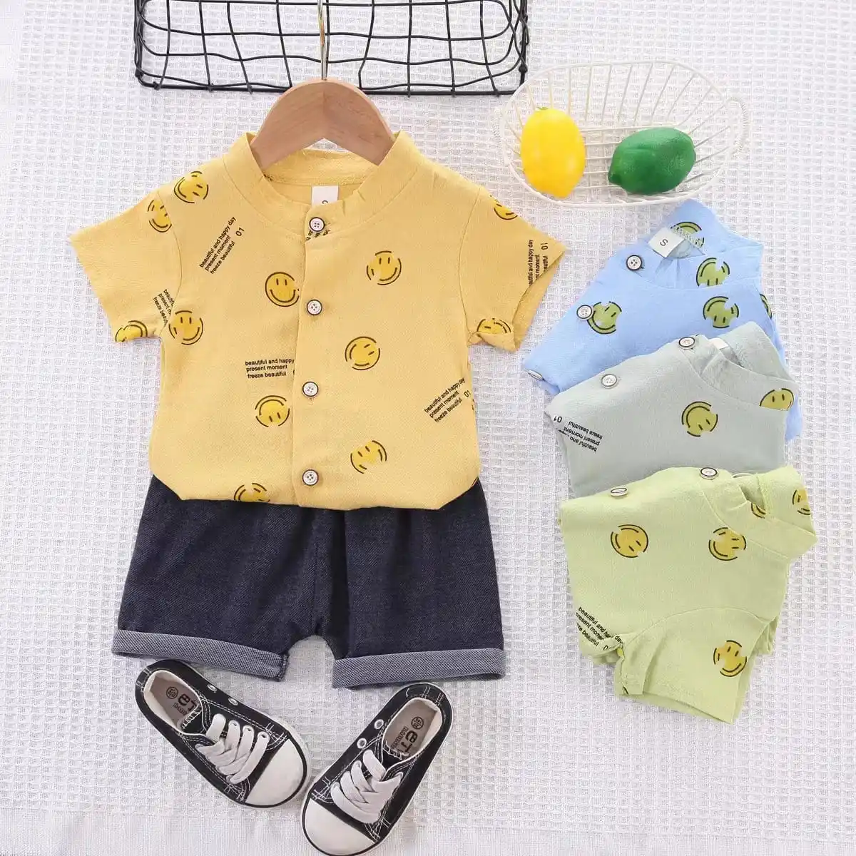 Conjuntos de ropa para niños de 6 meses a 2 años con patrón de sonrisa de estilo informal de nueva colección al por mayor