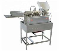 Machine de remplissage et de scellage d'ampoules à double aiguille pour emballages en verre de style normal et européen
