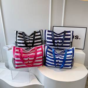 Bolsos de compras de rayas blancas y negras de lona informal de alta calidad, bolso de hombro grande, bolso de playa con bolsillos exteriores - Product Image 1