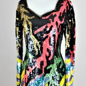 Fun and funky and absolutely cool dress...this is a bit form fitted, but also gives some stretch around the bottom. This is circ