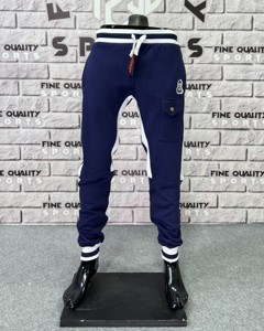 Directo de fábrica personalizado OEM 100% algodón Jogger pantalones botón decoración acanalado plano moda Casual deportes al aire libre pantalones de rayas laterales - Product Image 2