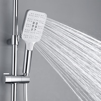 Pommeau de douche à haute pression à commande par bouton, design rectangulaire chromé blanc, débit d'eau important, jet pluie et massage, 3 fonctions