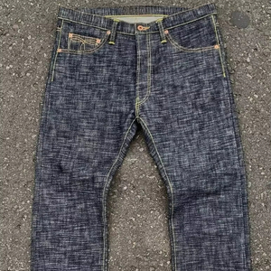 กางเกงยีนส์ทรงตรงแบบลำลองปรับแต่งได้ ผ้าฝ้าย 100% สีเข้ม ลุคขาดๆ ระบายอากาศได้ดี กันน้ำ ปรับแต่งแผ่นปะเอวได้ มีไซส์พลัส - Product Image 1