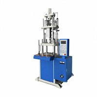 Machine de moulage par injection verticale HG-TW-100V-G avec écran tactile PLC intelligent et stabilité haute pression pour silicone médical/de plongée