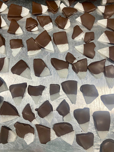 Indulge in tropical sweetness with pineapple dried fruit dipped in <b>dark</b> <b>chocolate</b> and mango coated in vanilla. - Product Image 4