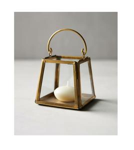 Linterna decorativa de metal y vidrio de Venta caliente con borde acabado dorado para decoración interior y exterior - Product Image 1