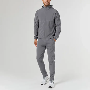 Ensemble de survêtement deux pièces pour homme, imprimé uni, respirant, coupe-vent, veste à capuche zippée et pantalon long, hiver 2025 - Product Image 1