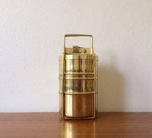 Classic golden brass tiffin <b>box</b> handmade by artisans with elegant design for storing Indian dishes during travel journeys - Product Image 4