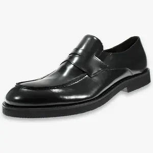 Classic elegant men's moccasin slipper in calf leather handmade in Italy with side elastic bands in black abrasive leather