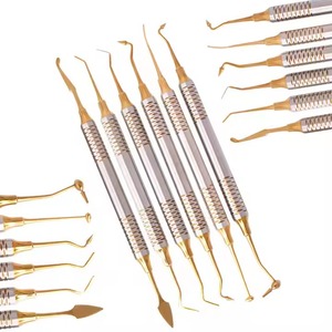 Espátula de acero inoxidable y herramientas de relleno para restaurador 6 en 1 Kit de instrumentos de llenado compuesto Dental con revestimiento dorado - Product Image 1