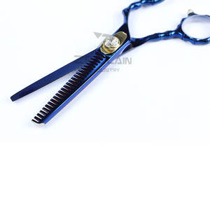 Venta al por mayor profesional peluquero 4Cr13 Acero inoxidable diestro tijeras de adelgazamiento con 28 dientes tijeras de pelo de alta calidad - Product Image 3