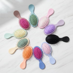 Lot de 10 mini-brosses à cheveux de voyage en plastique Lion Wholesale / Peignes ovales démêlants à sec - Product Image 1
