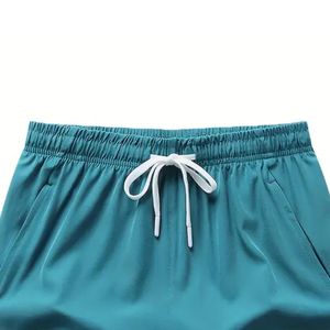 Shorts de sport pour homme à taille mi-haute, couleur unie, séchage rapide, légers, respirants, pour l'entraînement, la course et le fitness, avec taille élastique - Product Image 6