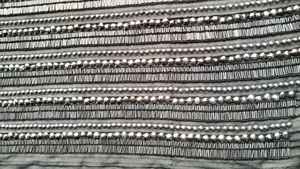 Tissu en dentelle perlée haut de gamme et écologique avec broderie artistique traditionnelle élégante pour garnitures et accents de Lehenga pour filles - Product Image 2