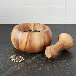 Mortero y pilón de madera pesada que proporciona un peso estable para moler especias, hierbas y mezclas, produciendo texturas consistentes. - Product Image 2