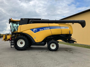 รถเกี่ยวข้าวขนาดเล็ก New Holland CX7090 10 แถว ระบบเกียร์ ขับเคลื่อนด้วยเกียร์ พร้อมจำหน่าย มีสต็อก คุณสมบัติพรีเมียม จัดส่งรวดเร็ว - Product Image 4