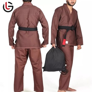 Uniforme de Taekwondo de calidad superior de moda caliente con etiquetas personalizadas Servicios OEM hechos en fábrica Buena calidad con función elástica - Product Image 1