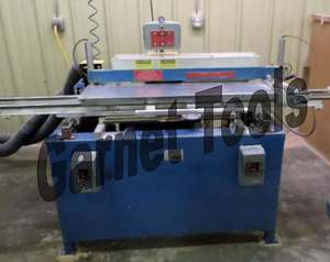 Máquina de fabricación de puertas de panel elevado - Product Image 1