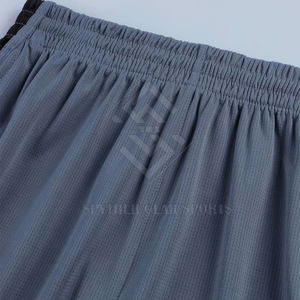 Tenues de basket-ball respirantes pour hommes fabriquées au Pakistan, couleurs et logo personnalisés, haute qualité, 100% polyester, prix bas - Product Image 5