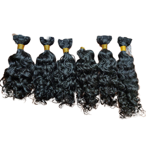 Vente en gros d'extensions de cheveux humains du temple Remy de luxe non transformés, faisceaux bouclés profonds en vrac, couleur noire naturelle, tissage permanent - Product Image 1