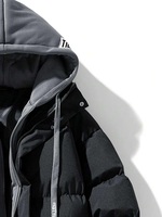 Blouson matelassé noir personnalisé avec capuche grise à cordon de serrage |   Manteau matelassé épais pour l'hiver |   Vêtements d'extérieur chauds et isolés pour hommes OEM/ODM